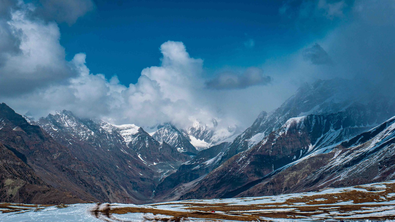 Majestic Himalayan landscape at golden hour with snow-capped peaks and lush forests